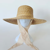 Wide Brim Flat Top Hat in Sand Straw w. Neck Shade