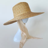 Wide Brim Flat Top Hat in Sand Straw w. Neck Shade